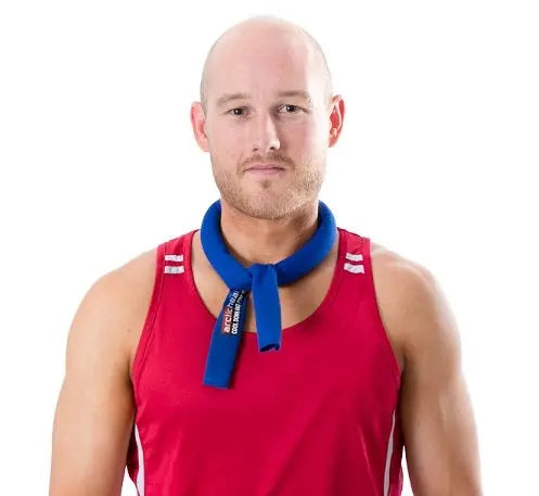 Person wearing Arctic Heat cooling neck tie around neck during outdoor activity