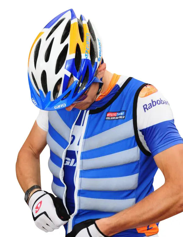 Cyclist wearing Arctic Heat cooling vest in hot weather competition